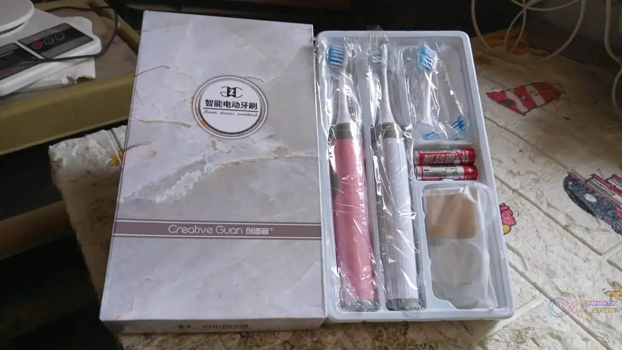 Adult Waterproof Electric Toothbrush Strong Sonic Charging with 4 Toothbrush Head and a toothbrush holder - infinityexculsivestore.com
