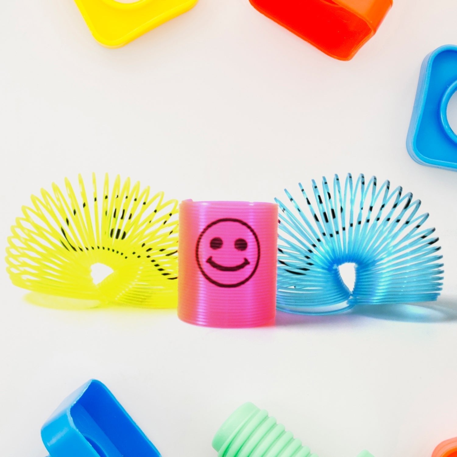 Multicolor Magic Smiley Spring, Spring Toys, Slinky, Slinky Spring Toy, Toy for Kids for Birthdays, Compact and Portable Easy to Carry (12 Pcs Set) - infinityexculsivestore.com