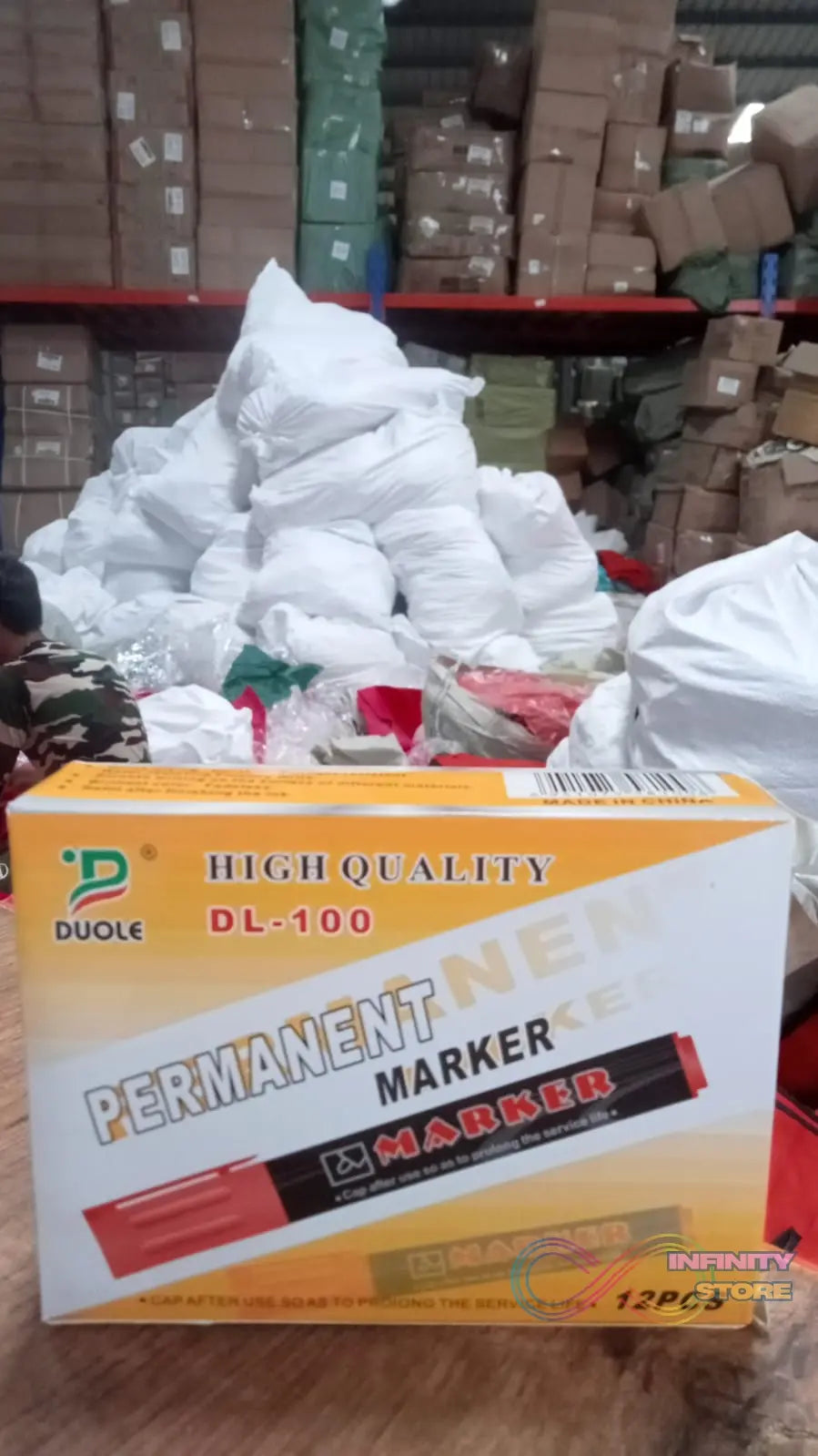 Red whiteboard marker pack with multiple markers in box