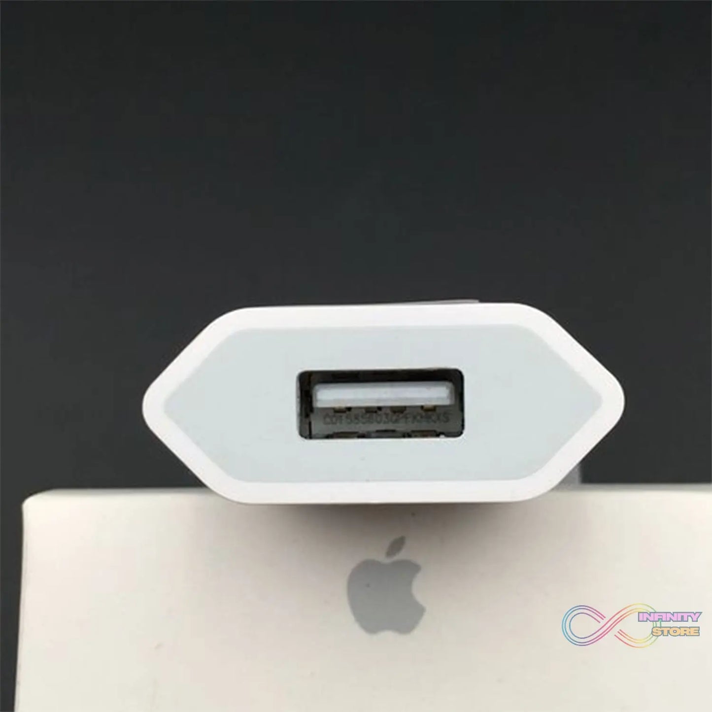 USB wall charger adaptor for iPhone and Android devices, highlighting its compact design