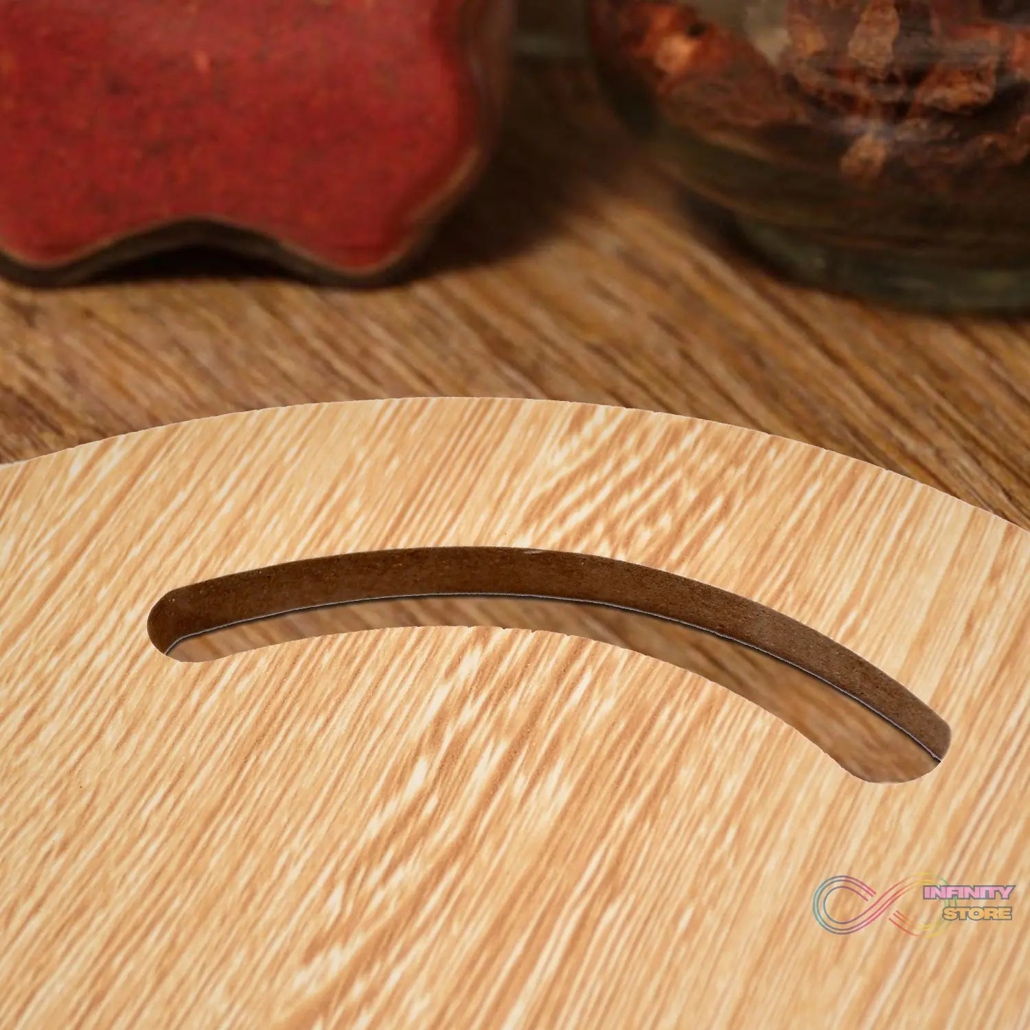 Small round wooden chopping board