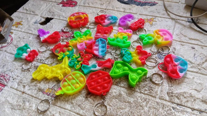 Compact Silicone Pop it Keychain Toy - Birthday Return Gift of Kids - Portable Bubble Popping Fun Stress Relief Fidget Toy (mix design | 1 Pc) - infinityexculsivestore.com