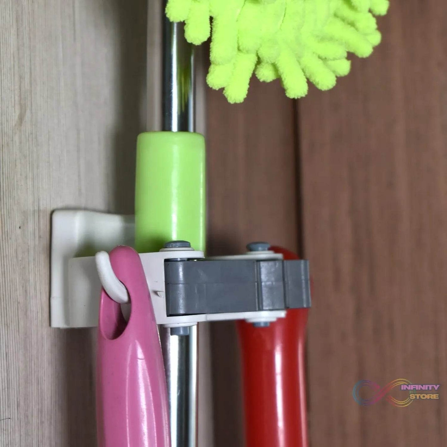 Invisible Mop Hanger used in all kinds of place like houses, offices, general stores for holding and hanging various mops and stuffs easily. - infinityexculsivestore.com