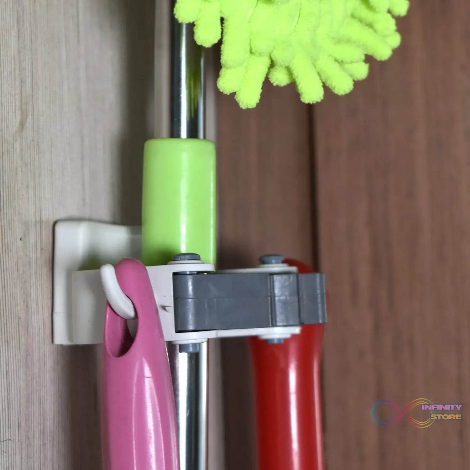 Invisible Mop Hanger used in all kinds of place like houses, offices, general stores for holding and hanging various mops and stuffs easily. - infinityexculsivestore.com