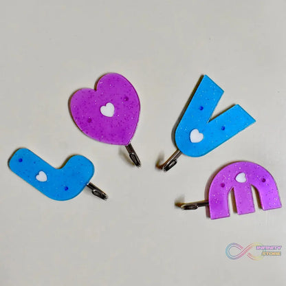 Love-shaped self-adhesive hooks for home use.