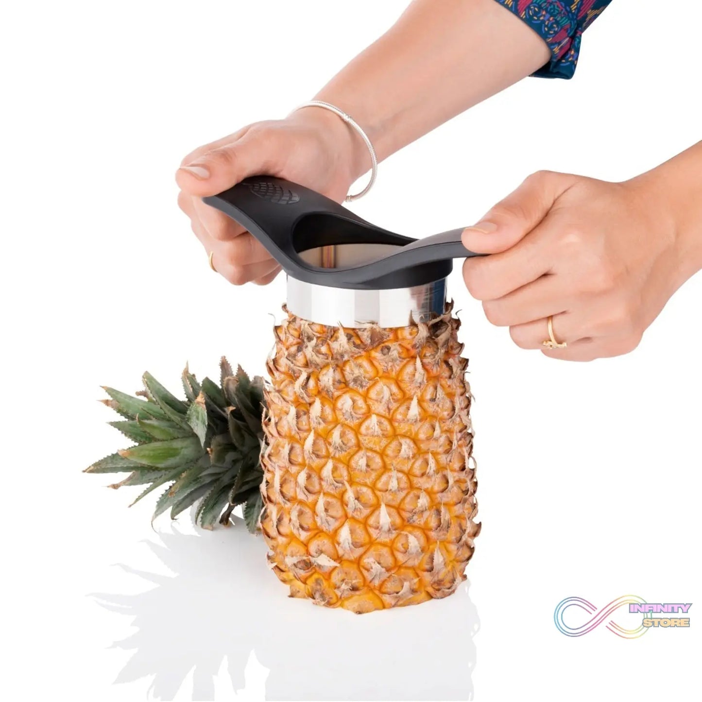 Pineapple slicing tool for household and kitchen purposes.