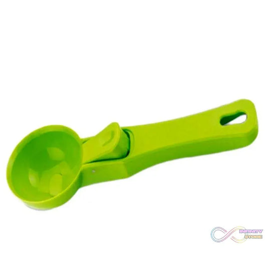 Green plastic ice cream scoop, single piece.