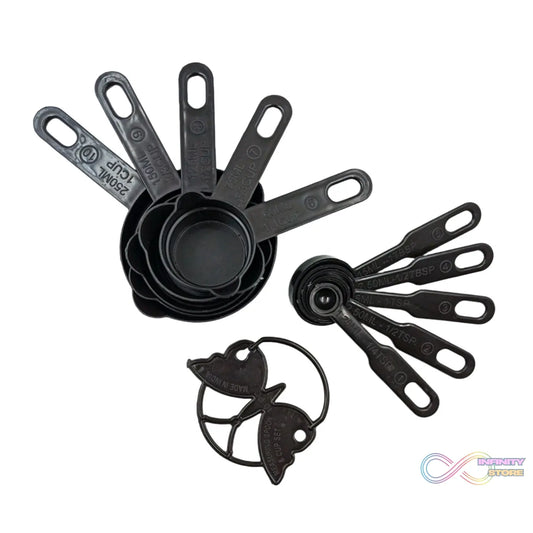 Black plastic measuring cups and spoons set with an 11-piece collection, including a butterfly-shaped holder