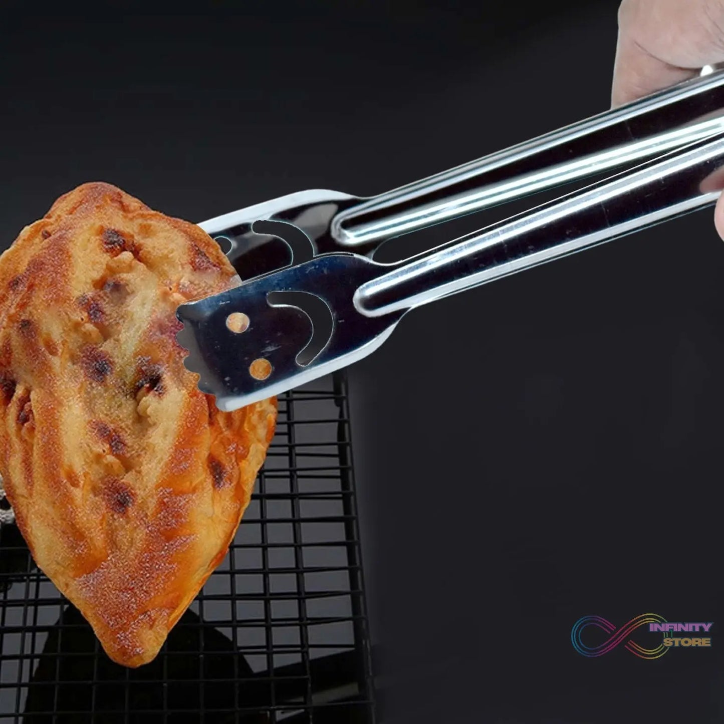 Stainless steel tongs, one piece, for everyday use in the kitchen.