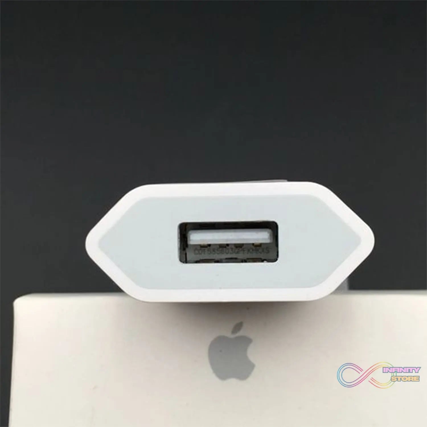 USB wall charger adaptor for iPhone and Android devices, highlighting its compact design